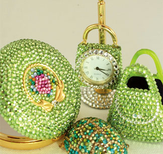 These clocks feature Swarovski ® crystals. They are battery operated and include a replacement battery.